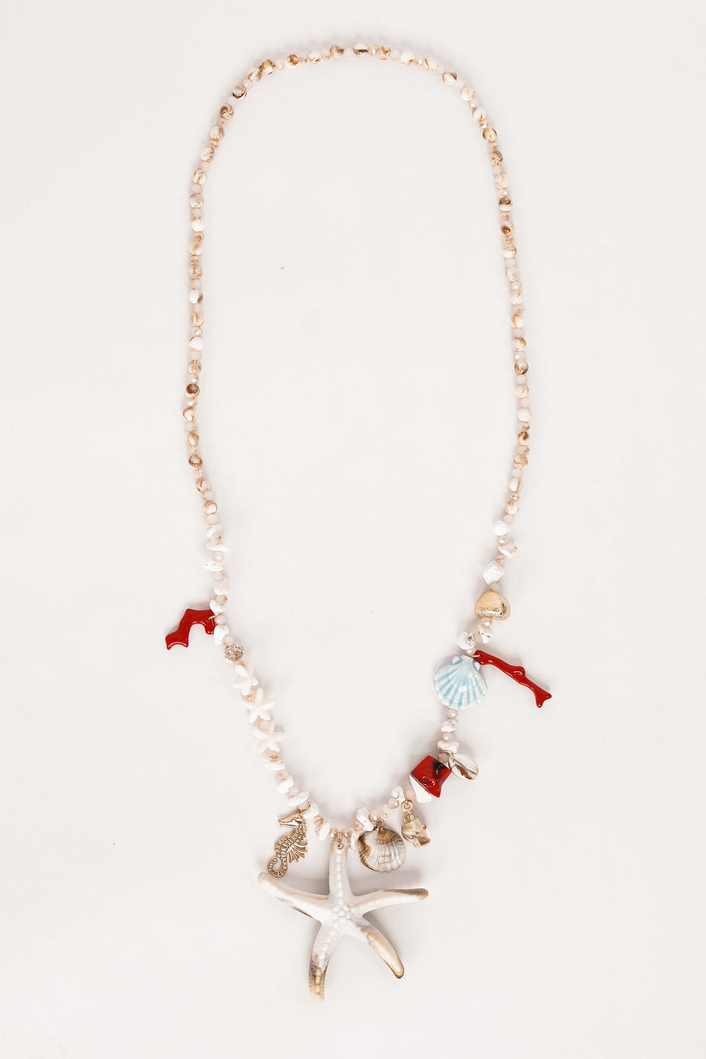 Collar de perlas con estrella de mar beige/rojo